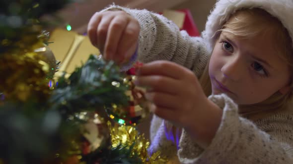 Girl at home at Christmas time alt