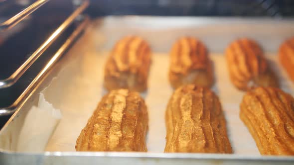 Full Readiness of Custard Eclairs in the Oven