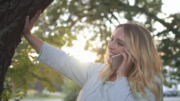 Woman Plus Size Cellphone Conversation Outdoors