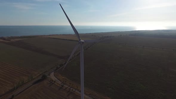 Rotating Turbines of a Wind Farm. Renewable Energy. Aerial alt