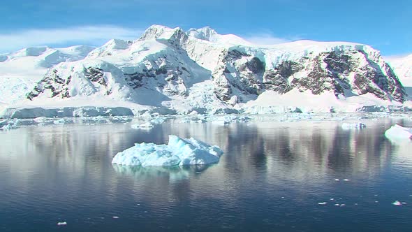 Iceberg in antarctic landscape