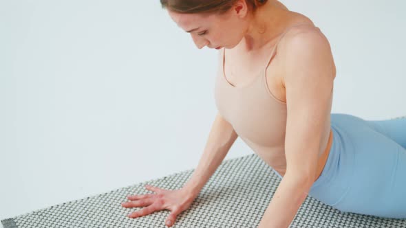 Close-up of young woman with exercise mat for yoga training. Healthy lifestyle concept alt