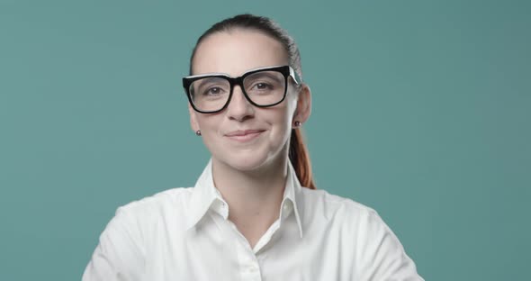 Woman wearing a surgical mask and fogged up glasses