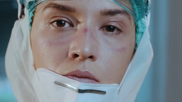 Infectionist doctor after hard working day during coronavirus covid-19 pandemic alt