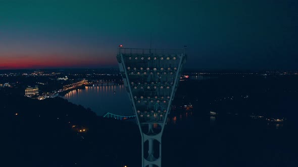 Switching on the Light Tower of a Football Stadium  alt