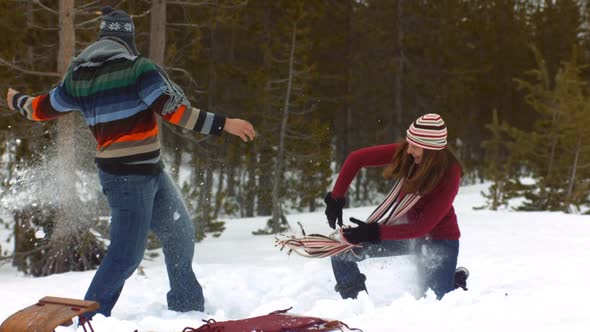 Woman laying on couch listening to mp3 player alt