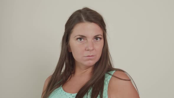 Woman Expressing Astonishment Head Shaking Disagreement or Rejection alt