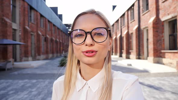 Girl in Eyeglasses Talking Via Video Link Recording Content Video Vlog alt