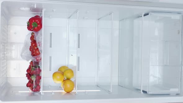 Opens Fridge Door Stop Motion Animation of Vegetables and Fruits in Kitchen Refrigerator Full of alt