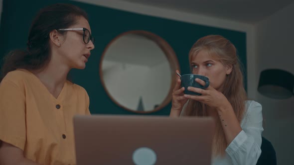 Two Girls Meet in a Coffee Shop alt