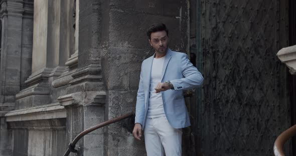 The Guy Looks At His Watch, Waiting For A Meeting alt