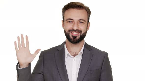 Closeup Portrait of Male Employer Wearing Beard and Mustaches Being Friendly Welcoming Other People