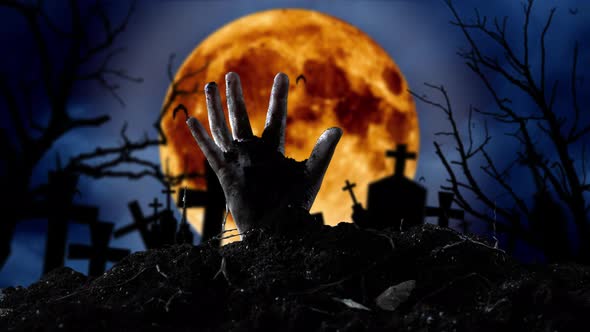 Zombie Hand Comes Out of the Grave and Bats Fly. Graveyard Background alt