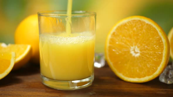 Organic Fresh Orange Fruit Juice Pour Into Glass