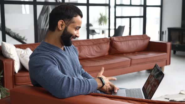 Indian Man Take a Part in Online Webinar Using Computer App for Video Connection alt