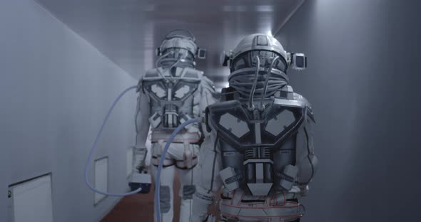 Astronauts Walking Down a Corridor alt