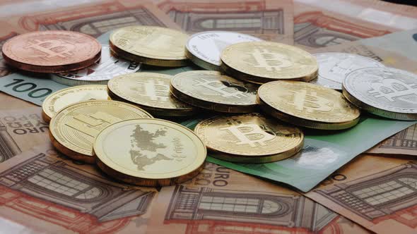 Bit Coin BTC Ethereum ETH and Litecoin LTC Coins Digital Money on Euro Banknotes