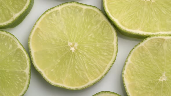 Lime Slices Closeup, Macro Food Summer Background, Fruits Top View. Rotate alt