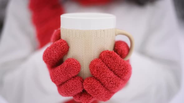 Woman With Cup Of Hot Coffee Or Tea In Winter