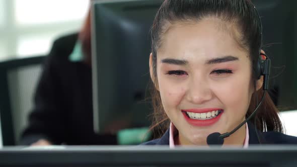 Business People Wearing Headset Working in Office alt