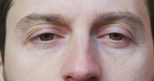 Man looking down and around alt