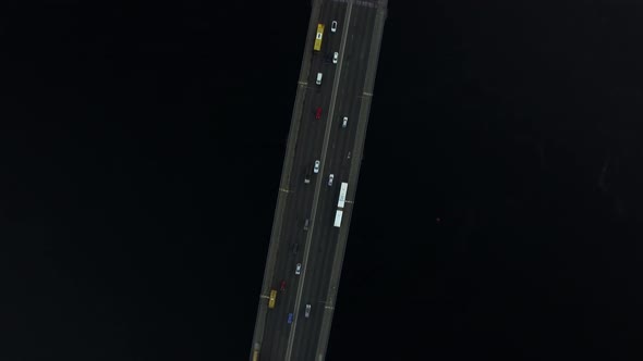 Car Driving on Bridge Highway Over River. Top View Car Traffic on River Bridge alt