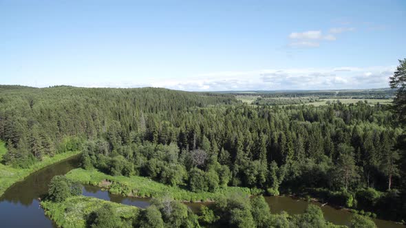 Aerial View of Green Forest and Winding River Valley in Summer Russia alt