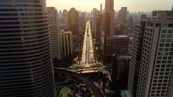 4k Aerial city view of Bangkok dowtnown, Flying over Bangkok, Thailand. alt