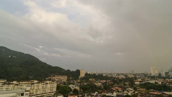 Timelapse aerial view cloudy raining town alt