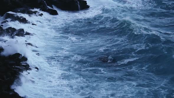 Deep Blue Sea Waves Splashing and Crashing Into Cliff Stones, Stormy Weather alt