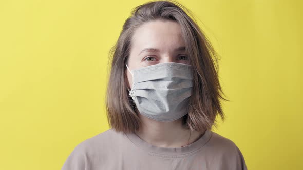 Portrait of a girl in a medical mask