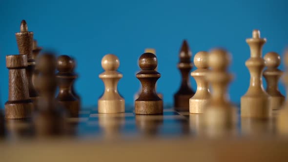 Closeup of Chess on a Blue Background alt