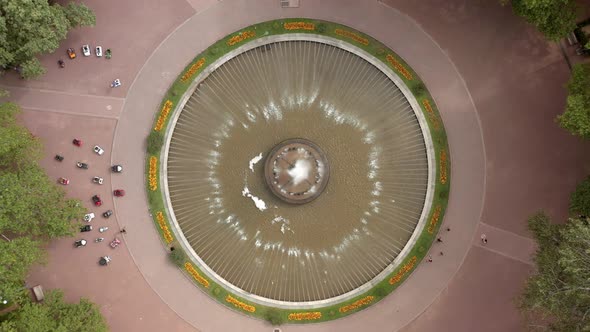 Aerial Drone Zoom Out Top View of Fountain in Vake Park in Tbilisi alt