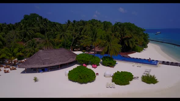 Aerial drone view landscape of exotic coast beach trip by blue ocean with white sandy background of  alt