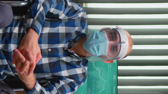 Businessman in Wheelchair with Mask Having Online Conference alt
