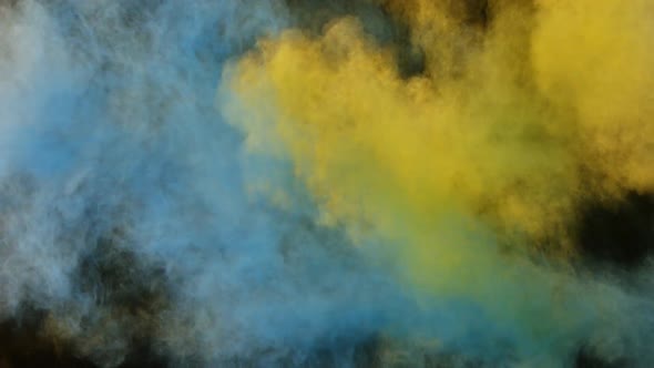 Close-up of color powder splashing alt