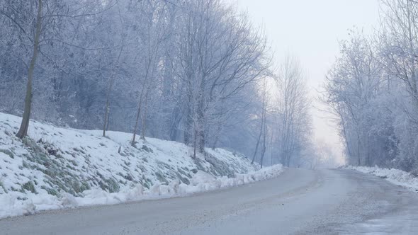 Winter scenery on Kraljevica hill in Eastern Serbian town Zajecar 4K 2160p UHD footage - Road going 