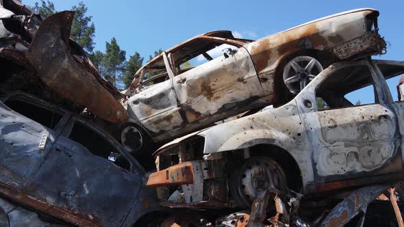 Shot and Burned Cars After the Fighting in the City of Irpin Ukraine alt