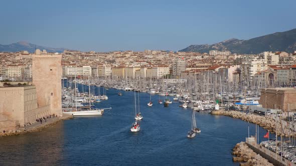 Yachts Coming To Marseille Old Port on Sunset. Marseille, France alt