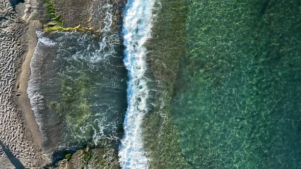Texture of the rocky beach aerial view 4 K Turkey Alanya alt