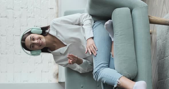 Young Woman Freelancer Talking with Client Video Remote Call Vertical Video alt