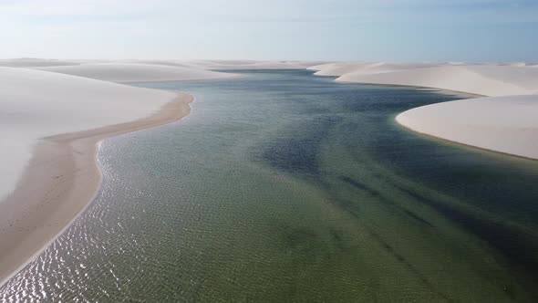 Sand dunes mountains and rain water lagoons at northeast brazilian paradise. alt