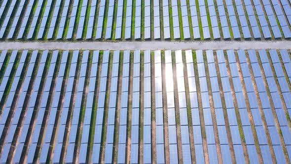 Eco Power Save Earth Solar power plant and 4K aerial view. Renewable energy. Green tech. alt