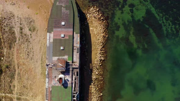 Old Abandoned Ship on Seaside That Ran Aground alt