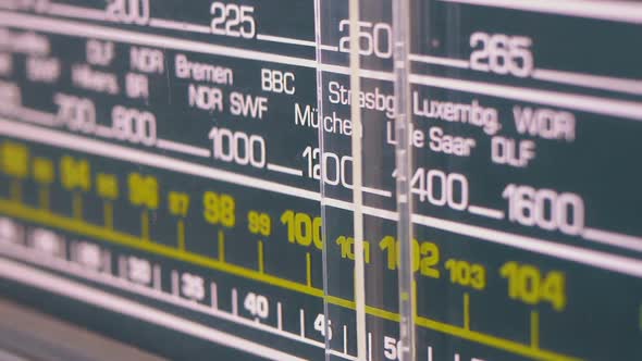 Tuning Analog Radio Dial Frequency on Scale of the Vintage Receiver alt