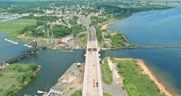 Aerial view naval maritime sailing port small with motor boats lined up alt