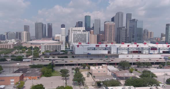 Drone view of downtown Houston skyline and surrounding area. This video was filmed in 6k and down sc alt