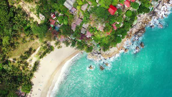 Lovely vacation destination. Vibrant colors of the Thailand coast with colorful houses palms and sec alt