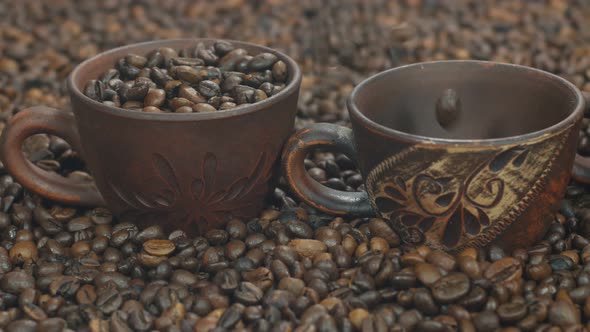 Coffee Beans Are Poured Into Beautiful Cups