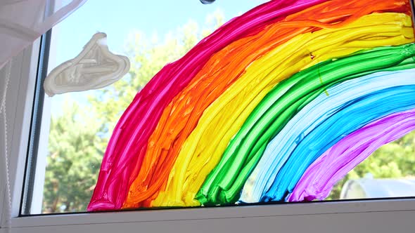Large Rainbow Pattern on Window During Covid19 Quarantine at Home alt